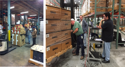 A logistics warehouse with two male workers wrapping a pallet